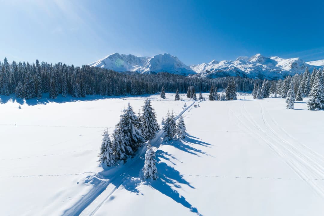 Snow-covered slopes and winter scenery around the mountain town of Zabljak