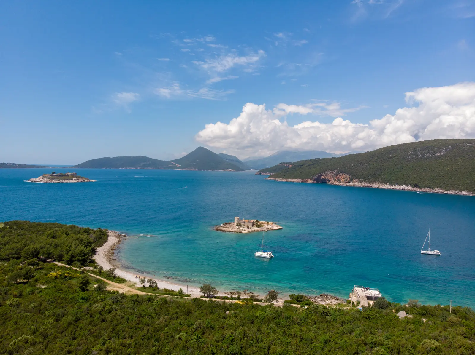 Mirište and Žanjice coves with the fortified island at the Bay of Kotor entrance